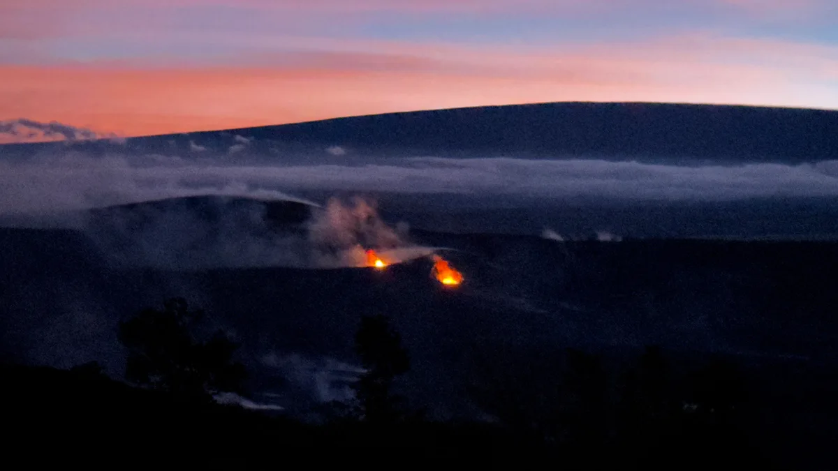 Kīlauea volcanic landscape at sunset.